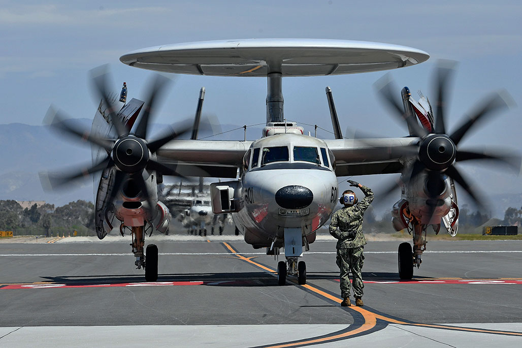 An E-2D Advanced Hawkeye assigned to the "Wallbangers" Airborne Command and Control Squadron (VAW) 117 arrives at Naval Base Ventura County (NBVC) following a seven-month deployment to U.S. 3rd Fleet and 7th Fleet areas of operations with Carrier Air Wing (CVW) 9, embarked aboard USS Abraham Lincoln (CVN 72). CVW-9 deployed with a combination of fourth and fifth-generation platforms that predominantly represent the “Airwing of the Future,” executing more than 21,307 fixed-wing and helicopter flight hours comprising of 10,250 sorties, 8,437 launches and 8,487 aircraft arrestments.