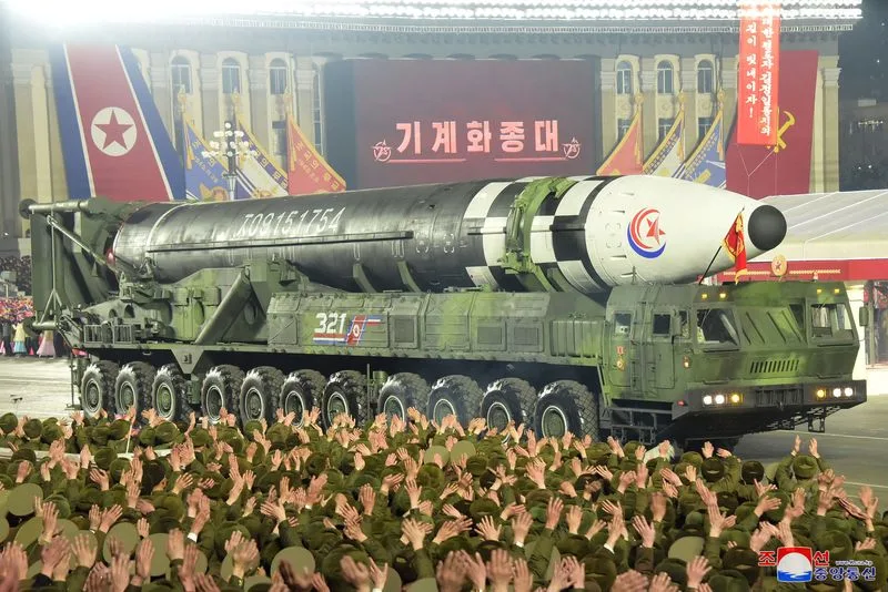North Korea displays largest number of nuclear missiles in nighttime parade